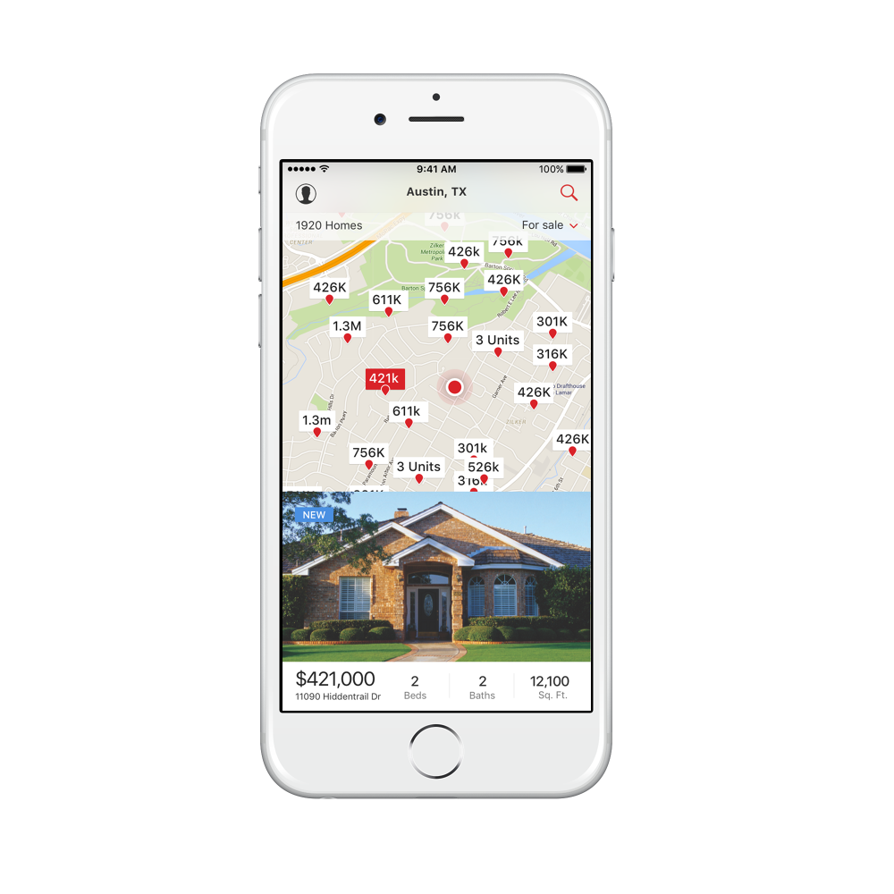 Realtor.com iOS search results on an iPhone showing a map of Austin with price pins and a selected listing card below it with a large photo, price, beds, baths and square footage